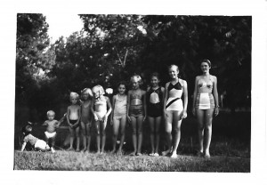 Kids going swimming in the creek by Lizzie Bees. This picture was taken in the 1940s and includes children of Sara Snider, Sue Spencer, and others.