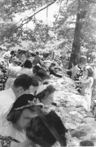 The men of the church had built long tables in rows under the trees. Alabama is hot and the last weekend of May was a prelude to the summer to come. After plates were filled many went to the cemetery to sit under the trees and on the brick wall that marked the cemetery dimension.